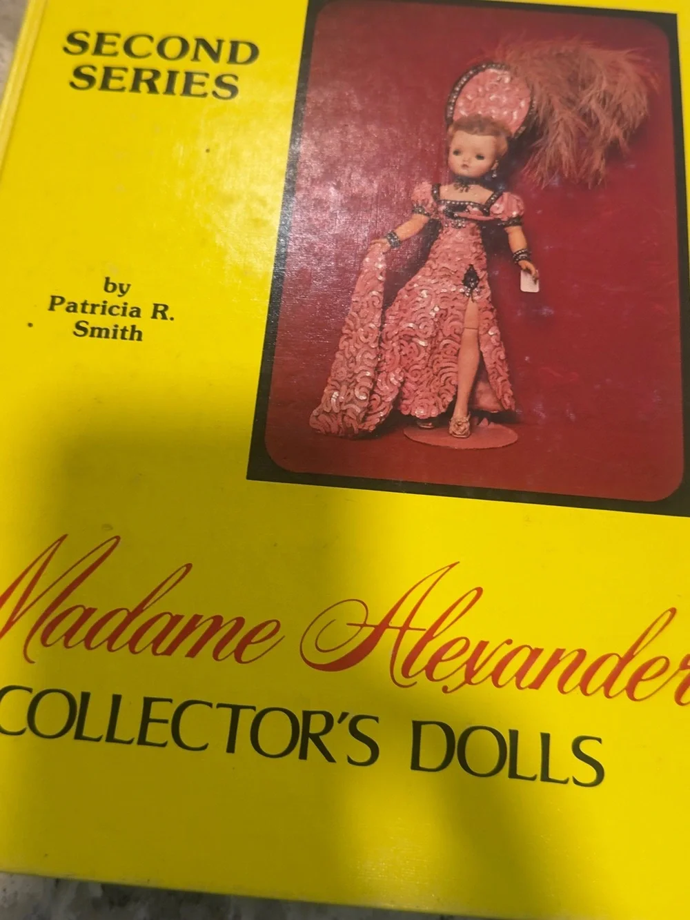 Madame Alexander Bright Yellow Collector's Dolls Book